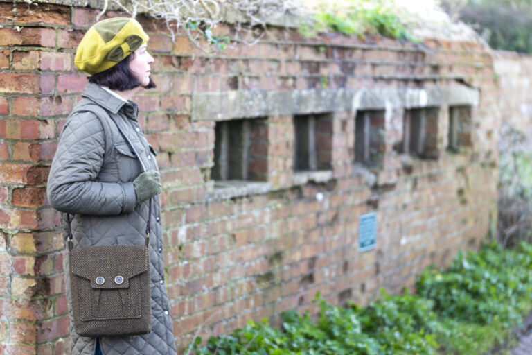 Emma standing outside a World War 2 pill box