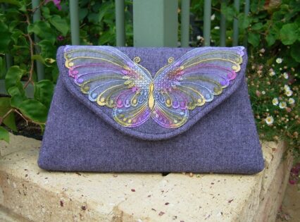 Tweed lace butterfly clutch bag