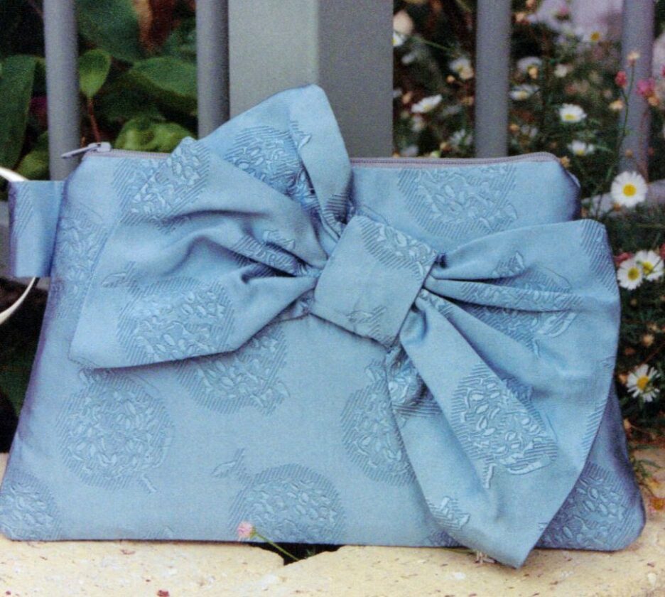 Bon-Bon clutch purse in aqua jacquard silk
