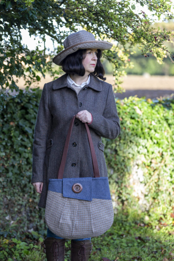 Preview of the Wattisham Tote Bag in retro tweed, modelled with matching Lynford hat